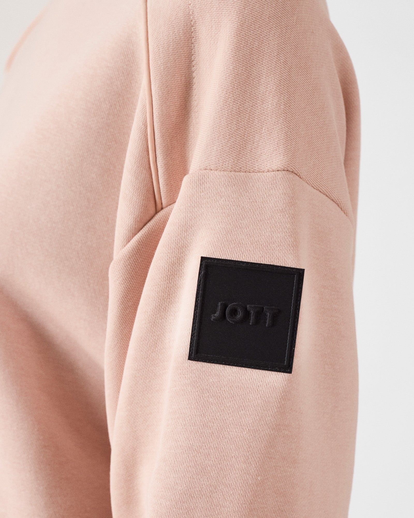 Sweat bimatière col rond Pêche clair Pinako